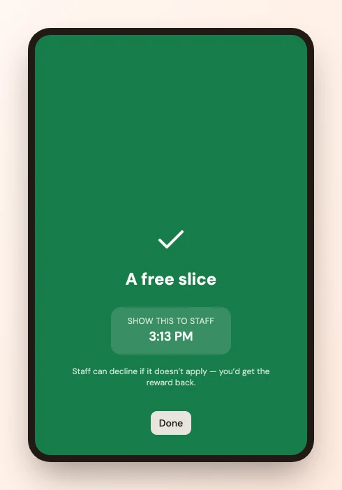 A full-screen confirmation reading "A free slice", "Show this to staff", and the time.